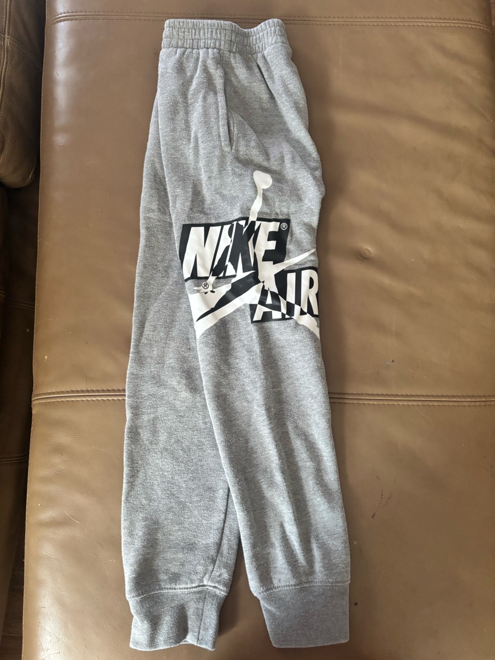 Nike Kids Gray Sweatpants with Black & White Logo